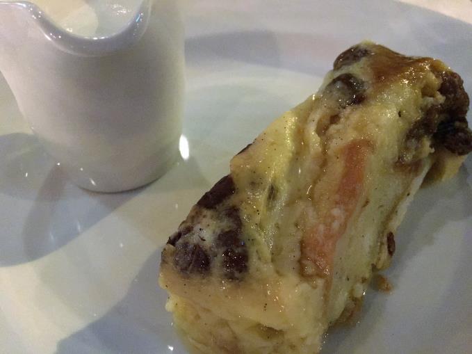 White chocolate bread and butter pudding with a marmalade glaze